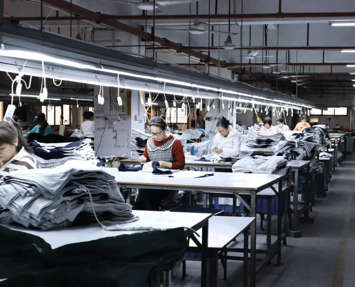 Everfar factory workshop team working on production tables.